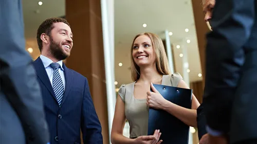 Business professionals having a conversation.