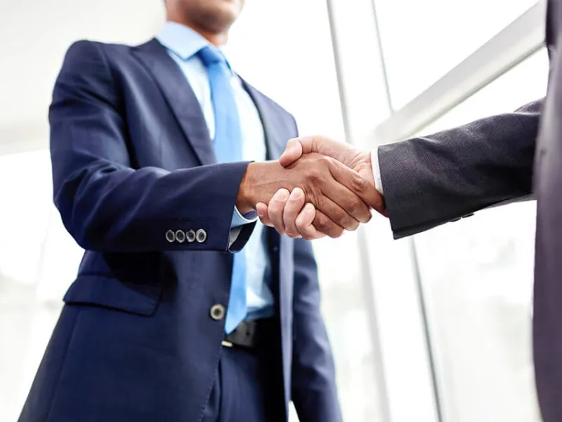 Two men shaking hands